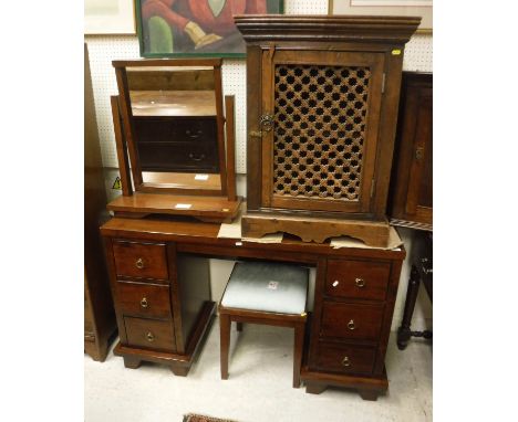 A Willis &amp; Gambier kneehole dressing table with swing mirror and stool, together with a small oak cupboard with pierced g