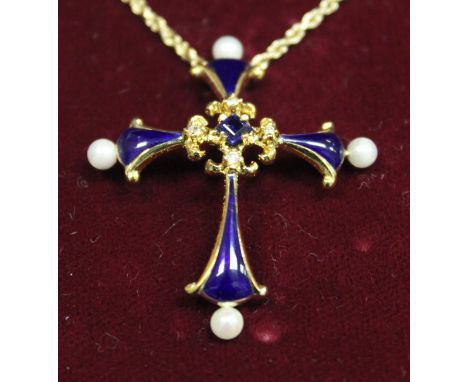 A "The Midnight Sapphire Cross" designed by The House of Igor Carl Fabergé for Franklin Mint