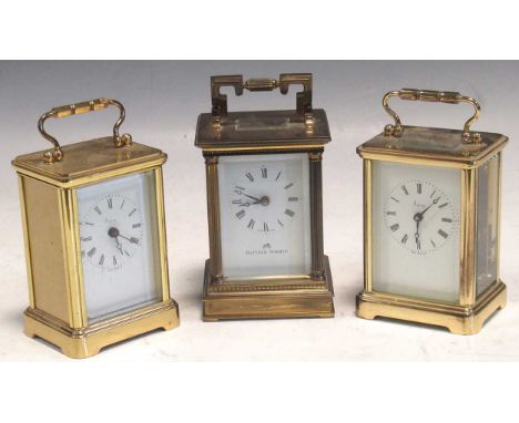 Two Asprey's gilt brass carriage clocks (one with battery quartz movement) and a Matthew Norman carriage clock, tallest 12cm 
