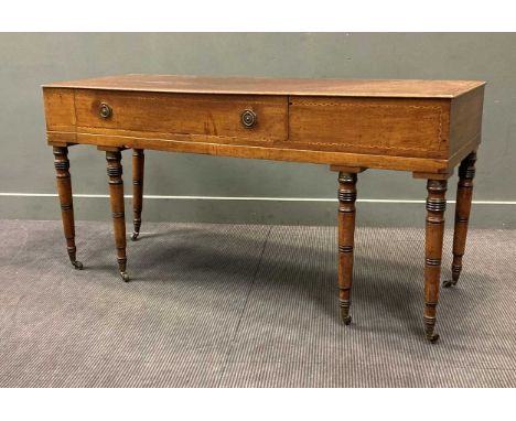 An inlaid mahogany sideboard converted from a 19th century pianola, with single drawer raised on six ring-turned legs and cas