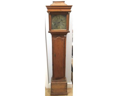 An 18th century longcase clock, Richardson Hexham, the inscribed brass square dial with foliate spandrels, in a stripped pine