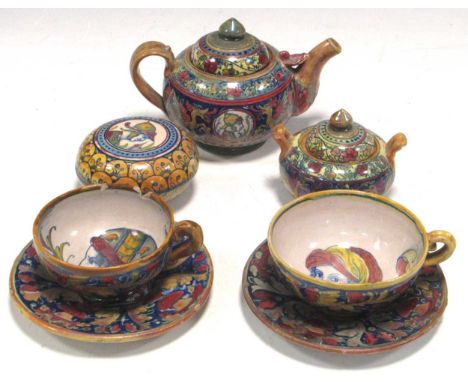 Alfredo Santarelli, a lustrous faience tea for two, including two teacups and saucers, a teapot, a sugar bowl and a dish