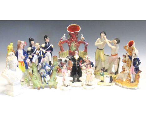 A group of Staffordshire figures to include 'The Death of Nelson', an inkwell modelled as a Turk, a spill vase modelled as a 