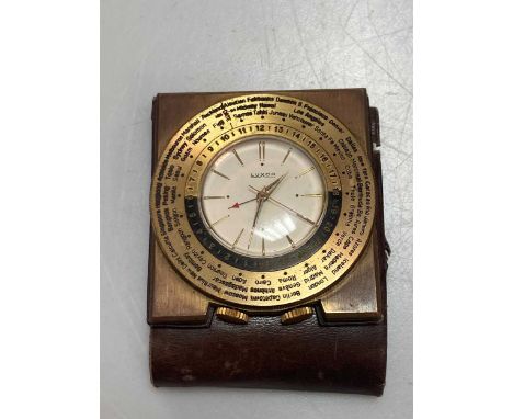 Luxor - A world time travelling alarm clock, circa 1960, model 1122, presented in the original leather travelling pouchProven