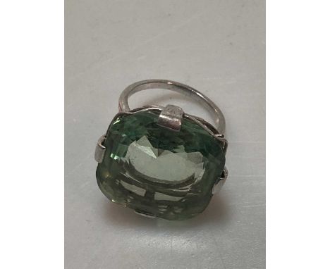 A green beryl cocktail ring, tested as 18ct gold, weight 15.3g