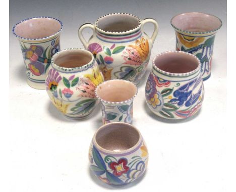 Seven Poole Pottery vases, one with two handles, tallest 13cm high (7)