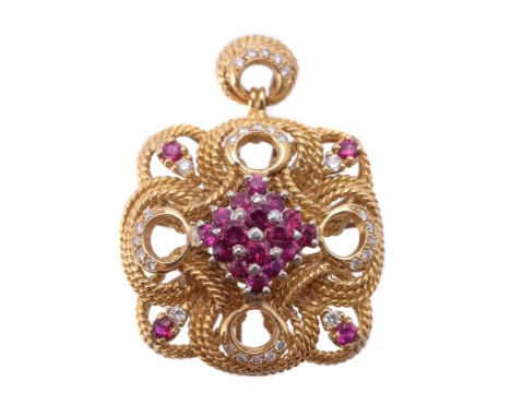 A ruby and diamond pendant, the central cluster of circular cut rubies, within a square shaped ropetwist surround, set with f
