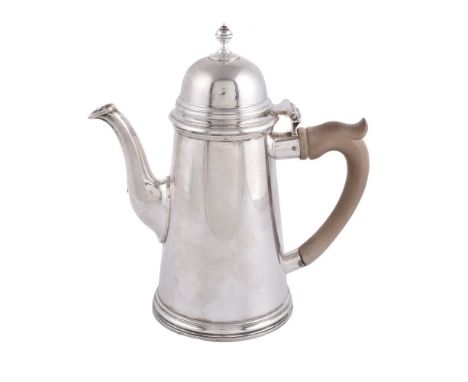 A silver straight-tapered coffee pot by C. J. Vander Ltd, London 1959, with a ball finial to the domed cover, a wooden scroll