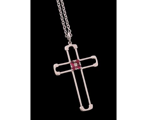 A ruby cross pendant, the openwork cross set with four circular cut rubies, approximately 0.47 carats total, on a belcher lin