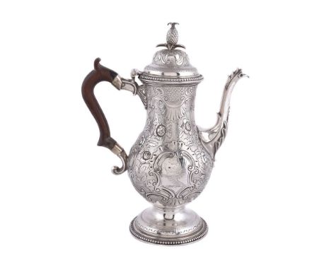 A George III silver baluster coffee pot probably by John Scofield, London 1776, with a pineapple finial to the ogee domed cov