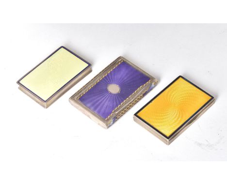 Three Austrian or German silver and guilloche enamel rectangular boxes, the first with amethyst enamel, Vienna 1872-1922 .900