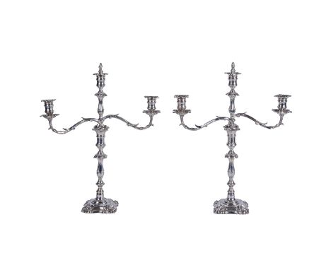 A pair of Edwardian electro-plated two branch three light candelabra by Elkington &amp; Co., date code for 1904, in mid Georg