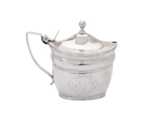 A George III silver oval mustard pot by William Abdy II, London 1807, with a ball finial to the conical cover, a harp handle,