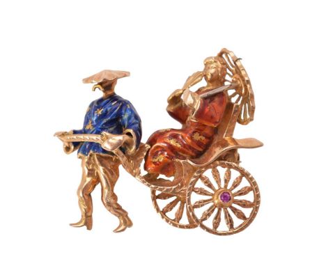 An enamel rickshaw brooch, designed as a seated lady in red enamel holding a parasol  in a hand pulled rickshaw by a man in b