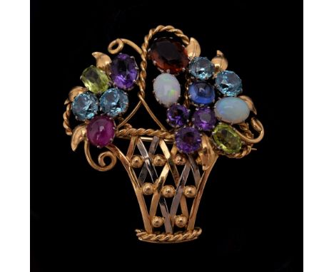 A gemset giardinetto brooch of openwork polished and ropework design with applied beads in white and yellow coloured metal, c