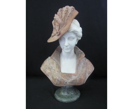 AFTER THE VICTORIAN ORIGINAL BUST of a young woman in a feather hat, white, rouge and grey marble. Modern. 59cm high approx.(