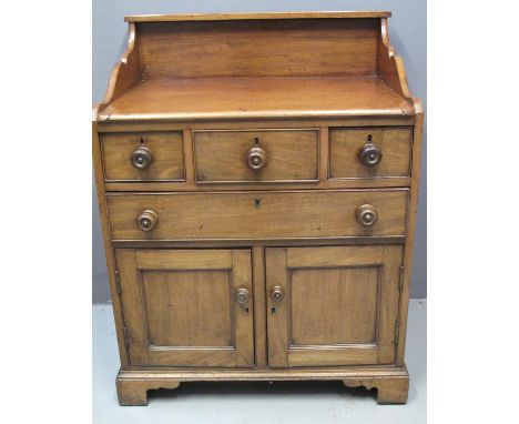 UNUSUAL VICTORIAN MAHOGANY TRAY TOPPED DESK with over shelf above an arrangement of four cock beaded short and long drawers w