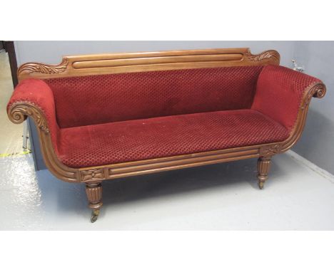 VICTORIAN MAHOGANY DOUBLE ENDED SOFA having carved foliate back, the upholstered scroll arms with carved front standing on fl