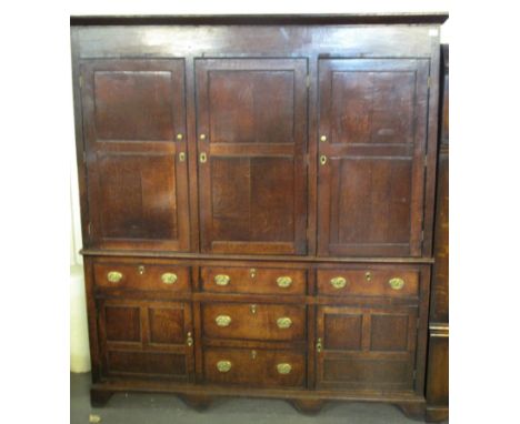 FINE LATE 18TH/EARLY 19TH CENTURY WELSH OAK TWO STAGE HOUSEKEEPERS CUPBOARD having moulded cornice (later), over three blind 