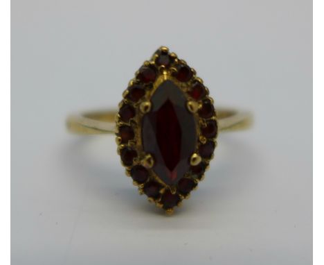 A 9ct gold garnet cluster ring, 2.4g, K