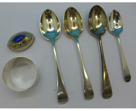 Four silver spoons, a silver napkin ring and a white metal pill box, 123g