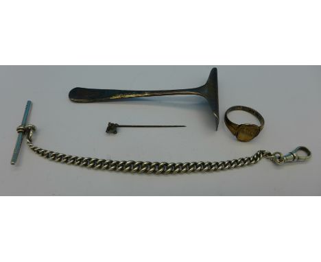 A silver watch chain, a silver pusher, a pin and a ring