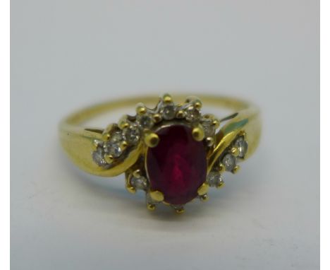 An 18ct gold, ruby and diamond ring, 3.1g, T