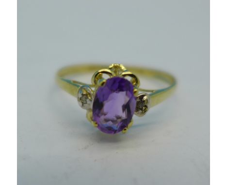 A 9ct gold and amethyst ring, 0.9g, O