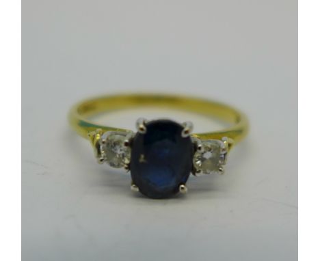 A three stone 18ct gold, sapphire and diamond ring, 2.4, N