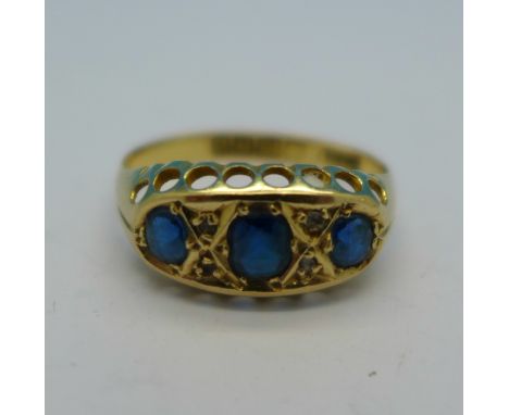 An 18ct gold, diamond and sapphire ring, 2.1g