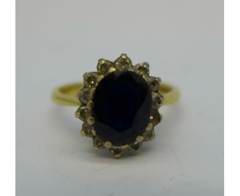 An 18ct gold cluster ring, 4g, N