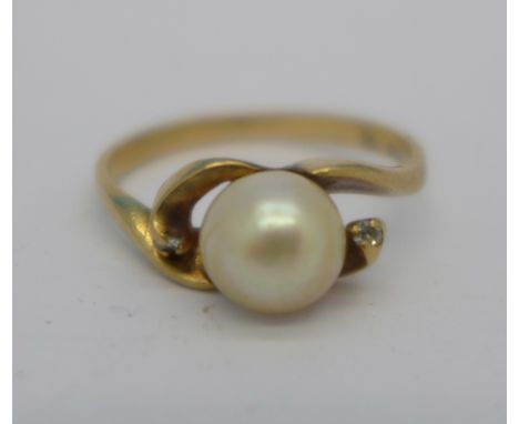 A 9ct gold, pearl and diamond ring, 1.9g, K