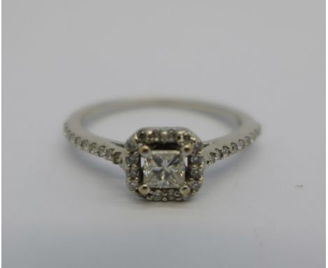 An 18ct white gold and diamond ring, 1.9g, K