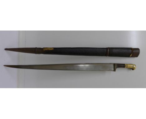 A 19th Century Khyber knife with original scabbard, 70.5cm