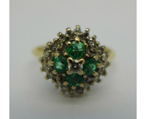 An 18ct gold, emerald and diamond ring, 4.6g, N