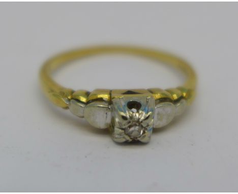 An 18ct gold solitaire diamond ring, 2.3g, M