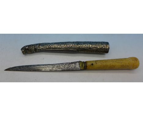 An 18th/19th Century Turkish Kard dagger in white metal scabbard with a walrus ivory handle