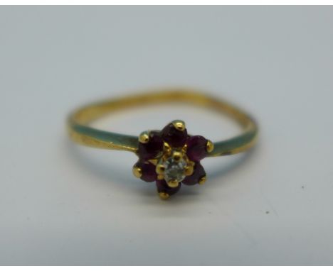 A 9ct gold, diamond and garnet ring, 1.3g, L