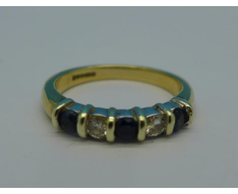 A 9ct gold, sapphire and diamond ring, 3.5g, N