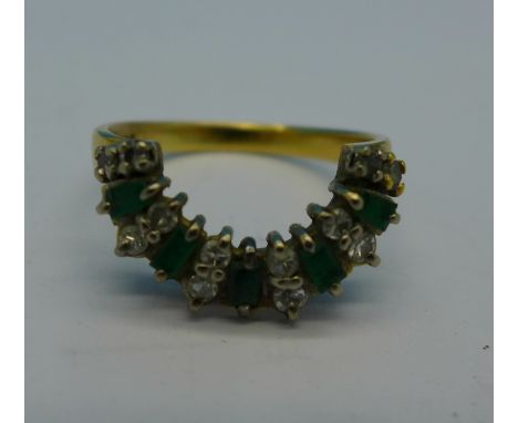 An 18ct gold, green and white stone ring, 3.8g, K