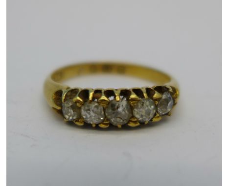 An 18ct gold and white stone ring, 2.9g, O