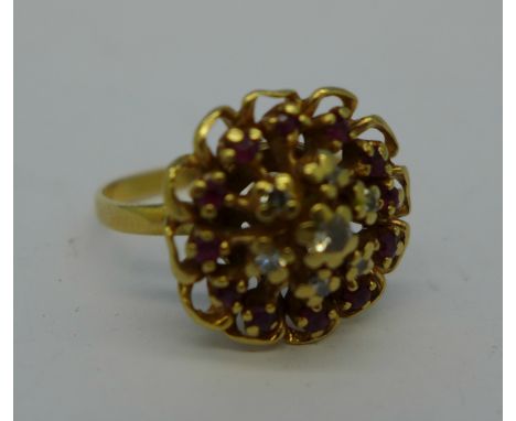 An 18ct gold, ruby and diamond ring, 5g, K