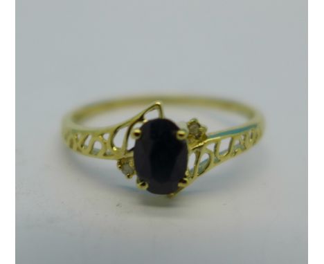 A 9ct gold, diamond and sapphire ring, 1.0g, O