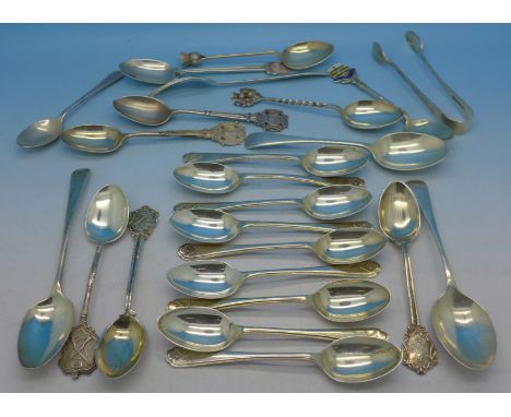 A collection of silver spoons, a fork and sugar bows, 340g