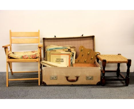 A vintage suitcase of cottons, sewing items, etc, together with a child's folding chair and footstool.