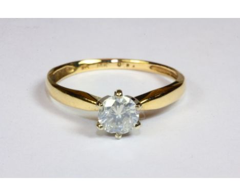 An 18ct yellow gold diamond solitaire ring approx .66ct (P).