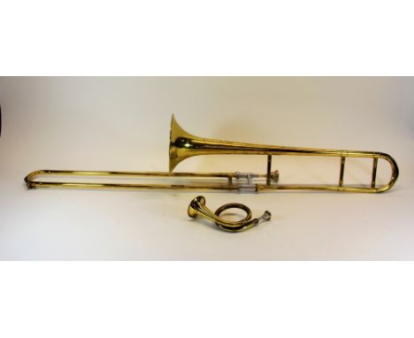A brass trombone and bugle.