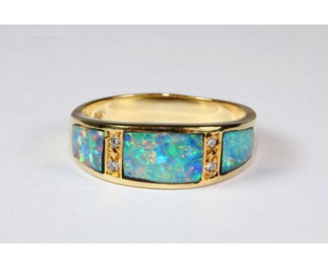 An unusual 18ct yellow gold diamond and opal ring, (O).