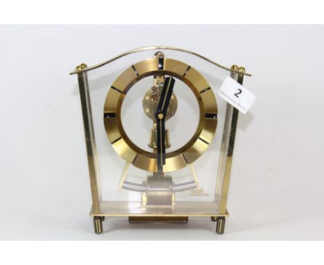 A Kundo vintage gilt brass electric clock, H. 18.5cm.