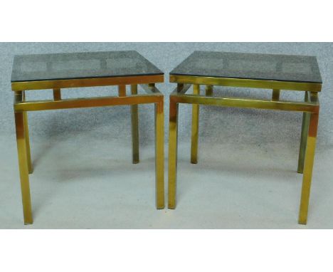 A pair of vintage Maison Jansen style brass framed lamp tables with plate glass inset tops. H.47 W.46 D.46cm 